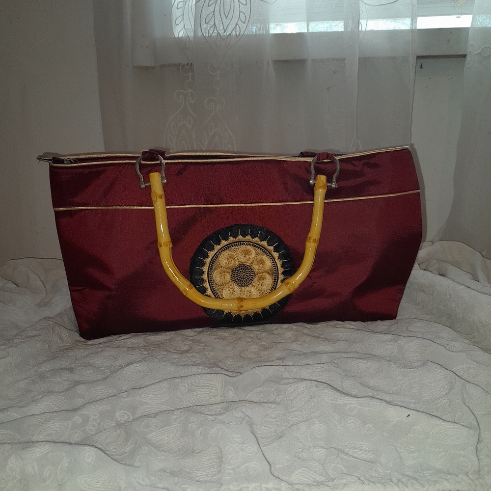 Elegant Burgundy Handbag with Bamboo Handles
